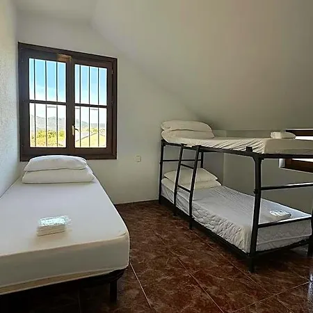 Cama Hab Compartida - Triton Villanua מלון